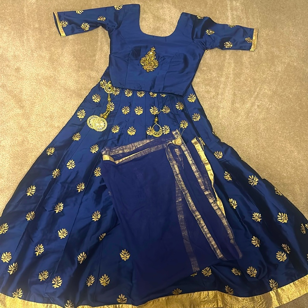 Women’s lehenga set with blouse, scarf, and bottom